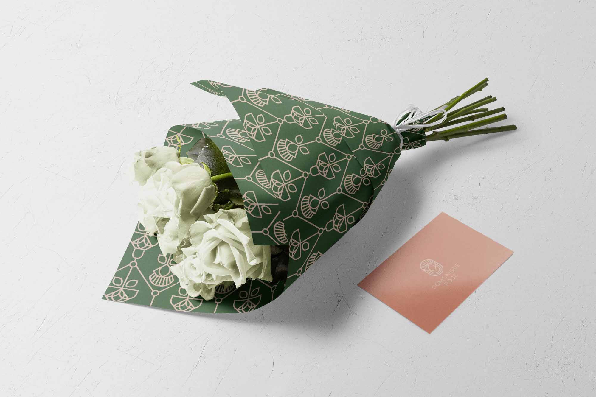 DOMONOIQUE ROSE WRAPPING PAPER AROUND BOUQUET OF ROSES